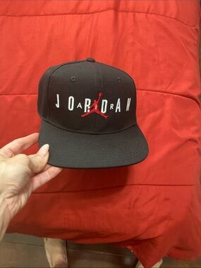 Jordan Black Snapback Hat with Red Jumpman and White Lettering